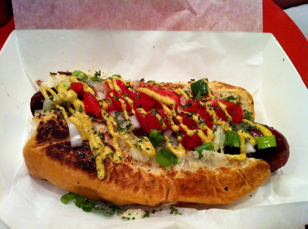 Our kielbasa sausage generously topped tomatoes, green onions, and mustard.